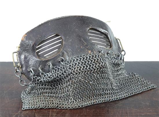 A WWI leather and chainmail tank mask, 7in.